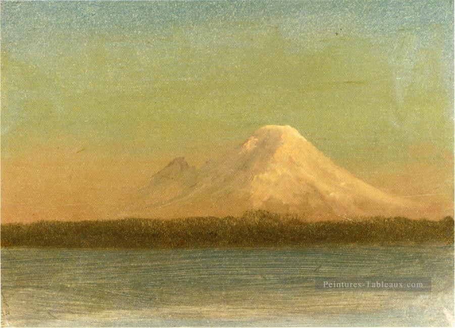 Montagnes enneigées au crépuscule Luminisme paysage marin Albert Bierstadt Peintures à l'huile